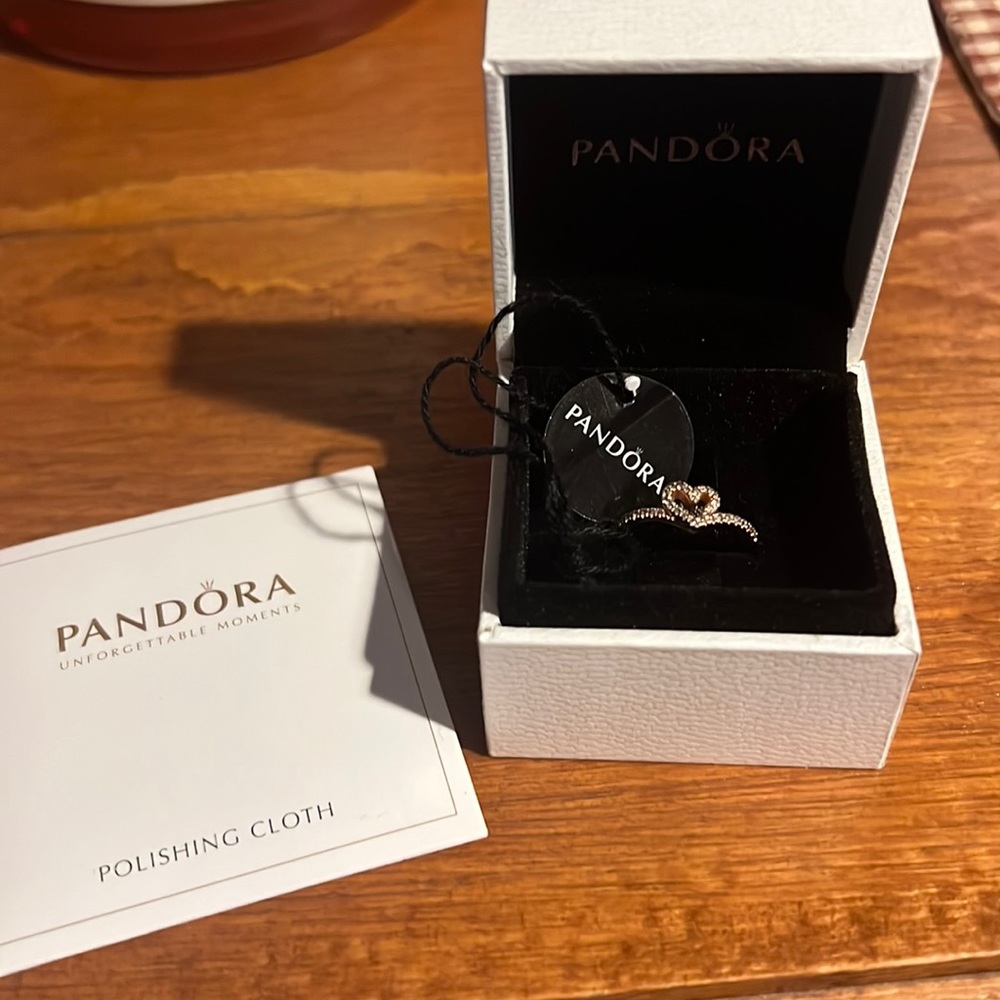 Pandora rose gold sparkling wishbone heart ring.